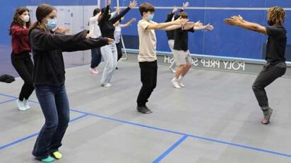 Dancer and choreographer Winston Dynamite Brown instructs students