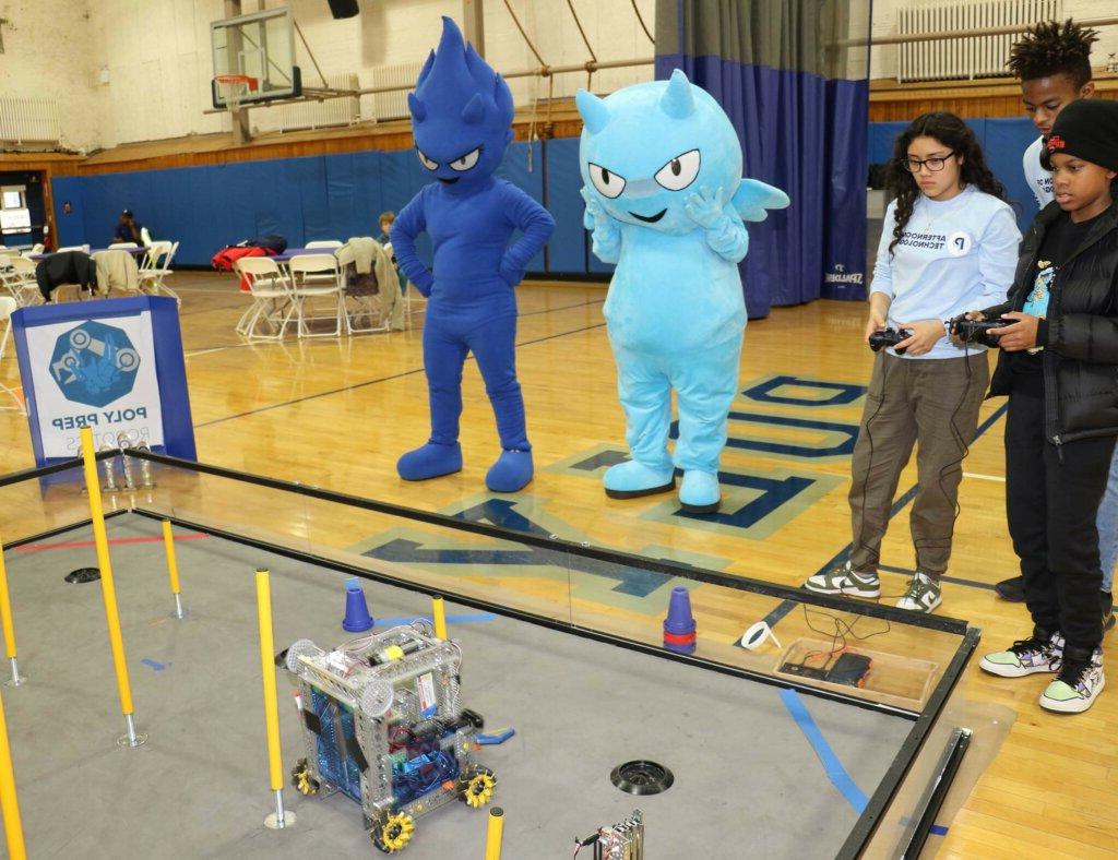 Afternoon of Tech with Blue Devil mascots and robot